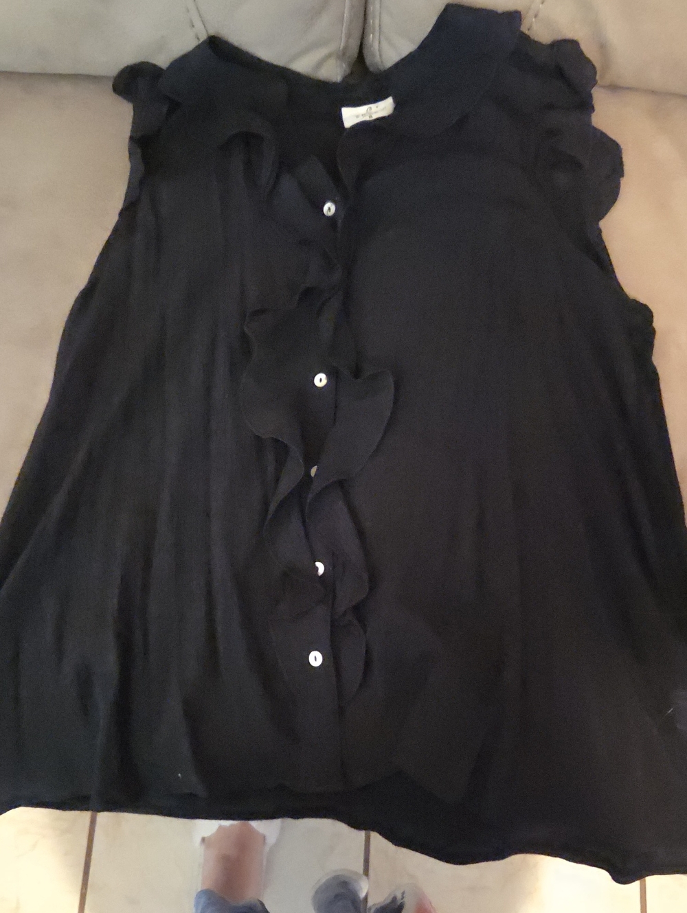 Black Ruffle-Front Sleeveless Blouse